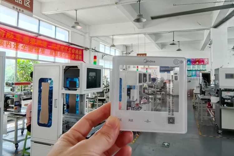 給你大廠(chǎng)氣質(zhì)：空調(diào)面板貼膜視覺(jué)貼膜機(jī)廠(chǎng)家-德尚精機(jī)
